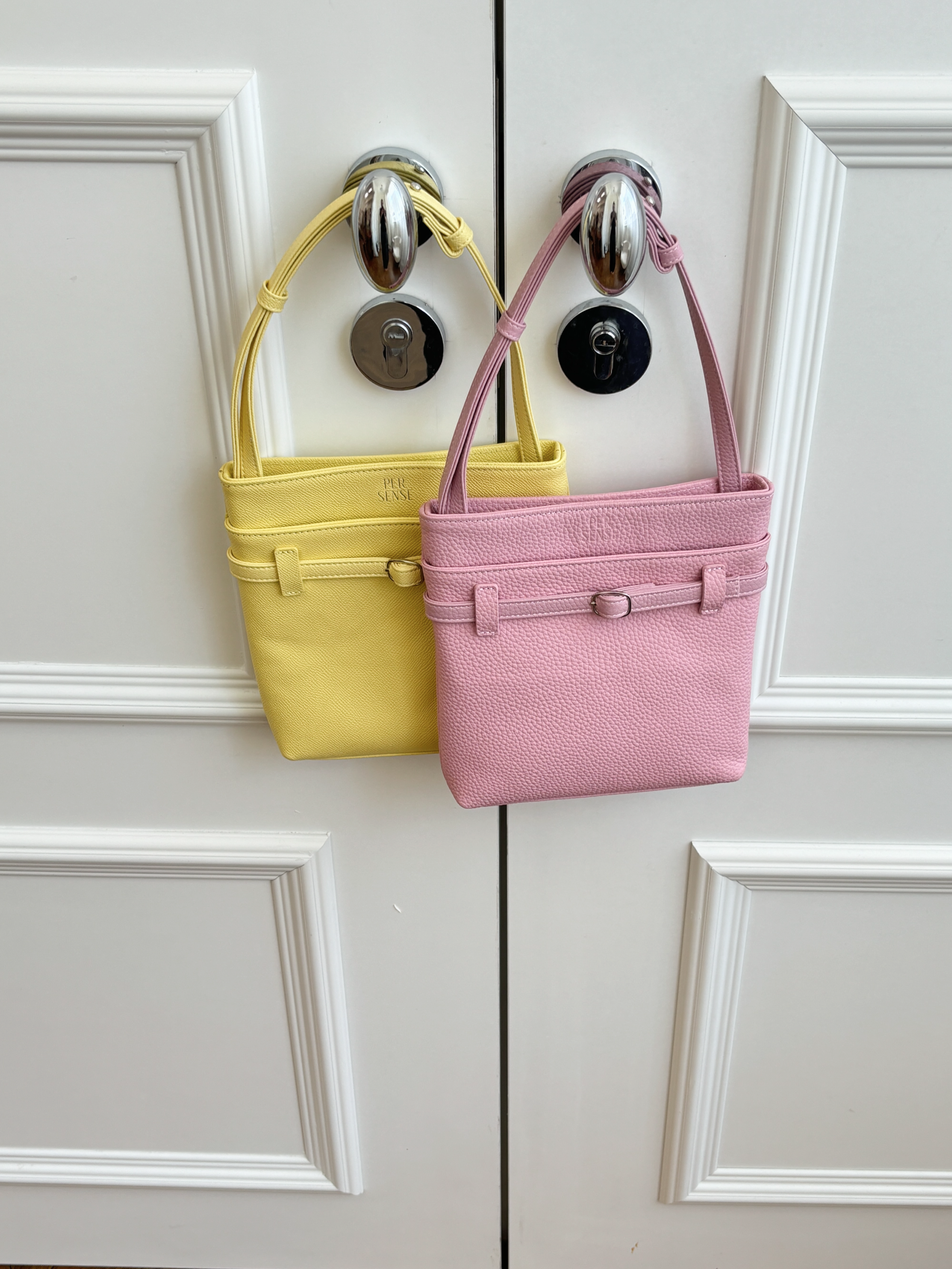 The Slim Buckle Pochette - Sakura Pink